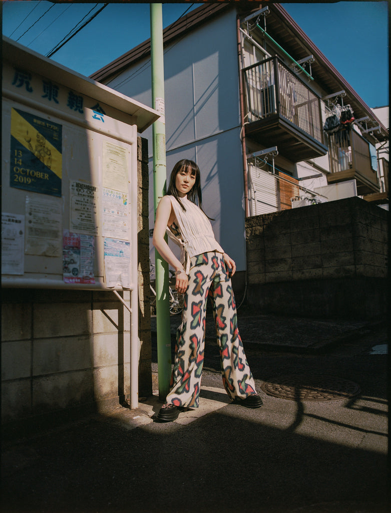 woman wearing multi-coloured summer kimono jumpsuit back