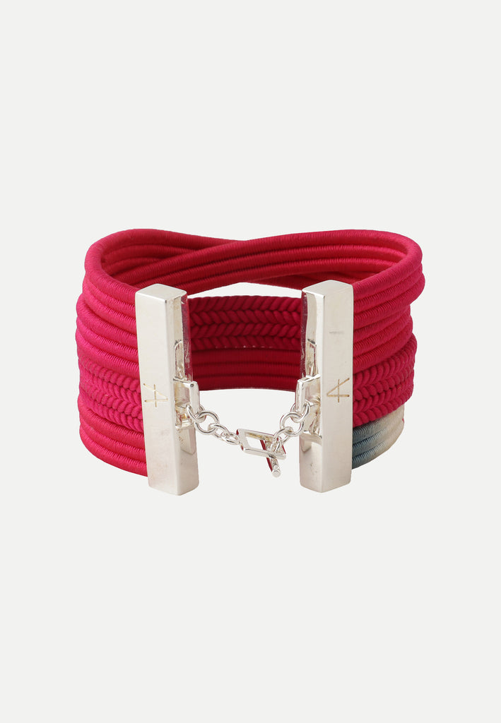 Bracelet made from different shades of fuchsia vintage silk obijime cords and silver plated findings. 