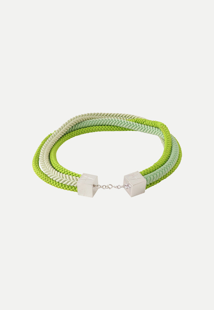 Necklace made from various shades of lime green vintage silk kimono obijime cords with silver plated findings.
