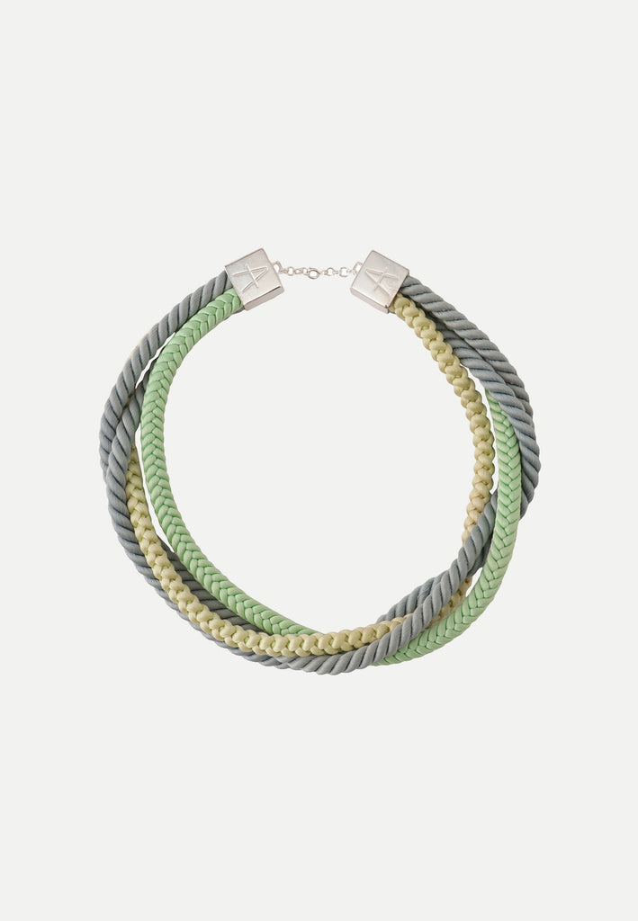 Necklace made from different shades of light blue and green vintage silk obijime cords and silver plated findings. 