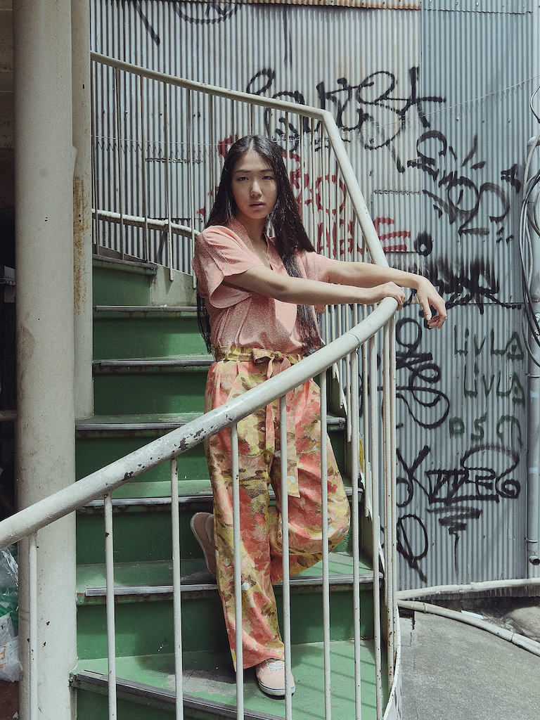 woman wearing peach multi-coloured kimono jumpsuit